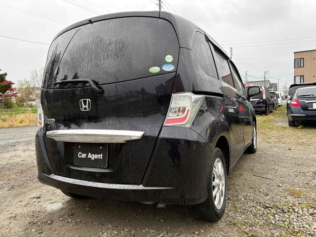 フリード G ジャストセレクション 4WD バックカメラ TV 両側スライド・片側電動 スマートキー 電動格納ミラー 3列シート AT アルミホイール 盗難防止システム 衝突安全ボディ ABS ESC エアコン パワーステアリング(29枚目)