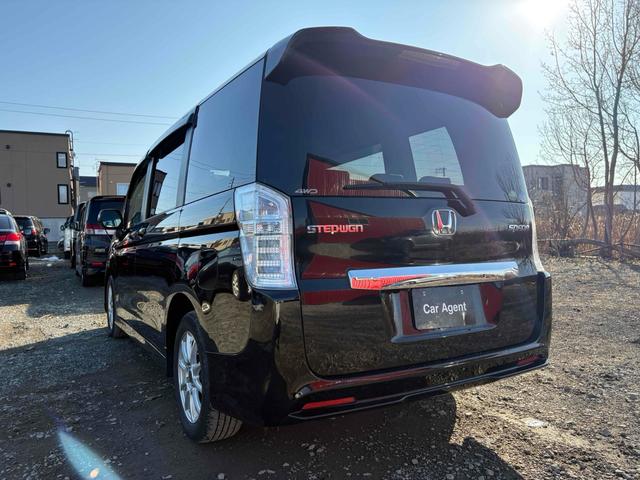 ステップワゴンスパーダ パワーエディション　４ＷＤ　ＥＴＣ　バックカメラ　ＴＶ　両側電動スライドドア　ＨＩＤ　キーレスエントリー　アイドリングストップ　電動格納ミラー　後席モニター　３列シート　ＣＶＴ　アルミホイール　盗難防止システム（21枚目）