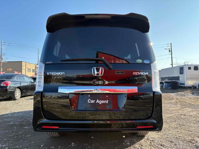 ステップワゴンスパーダ パワーエディション　４ＷＤ　ＥＴＣ　バックカメラ　ＴＶ　両側電動スライドドア　ＨＩＤ　キーレスエントリー　アイドリングストップ　電動格納ミラー　後席モニター　３列シート　ＣＶＴ　アルミホイール　盗難防止システム（24枚目）