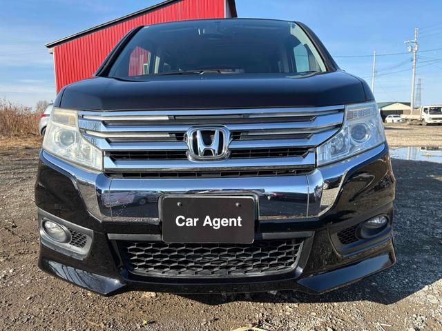 ステップワゴンスパーダ パワーエディション　４ＷＤ　ＥＴＣ　バックカメラ　ＴＶ　両側電動スライドドア　ＨＩＤ　キーレスエントリー　アイドリングストップ　電動格納ミラー　後席モニター　３列シート　ＣＶＴ　アルミホイール　盗難防止システム（28枚目）