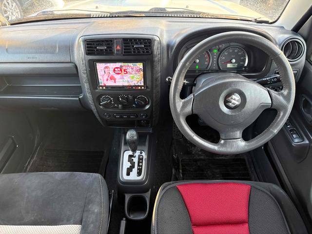 ジムニー ワイルドウインド 4WD フルセグTV ブルートゥース対応 キーレスエントリー 電動格納ミラー AT ABS ルーフレール アルミホイール 衝突安全ボディ エアコン パワーウィンドウ(2枚目)