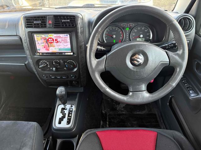 ジムニー ワイルドウインド 4WD フルセグTV ブルートゥース対応 キーレスエントリー 電動格納ミラー AT ABS ルーフレール アルミホイール 衝突安全ボディ エアコン パワーウィンドウ(3枚目)