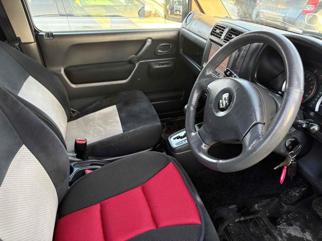 ジムニー ワイルドウインド 4WD フルセグTV ブルートゥース対応 キーレスエントリー 電動格納ミラー AT ABS ルーフレール アルミホイール 衝突安全ボディ エアコン パワーウィンドウ(5枚目)