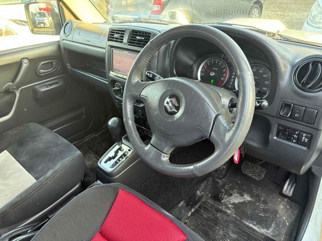 ジムニー ワイルドウインド 4WD フルセグTV ブルートゥース対応 キーレスエントリー 電動格納ミラー AT ABS ルーフレール アルミホイール 衝突安全ボディ エアコン パワーウィンドウ(6枚目)