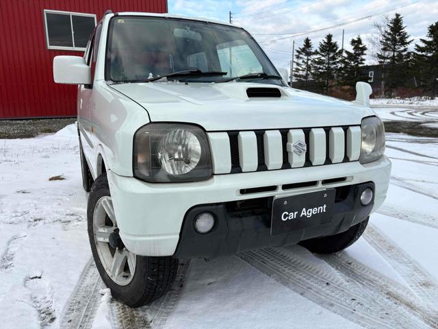 ジムニー ワイルドウインド 4WD フルセグTV ブルートゥース対応 キーレスエントリー 電動格納ミラー AT ABS ルーフレール アルミホイール 衝突安全ボディ エアコン パワーウィンドウ(9枚目)