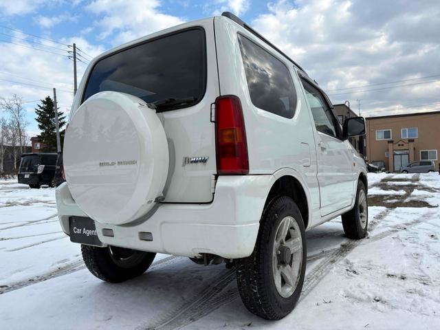ジムニー ワイルドウインド 4WD フルセグTV ブルートゥース対応 キーレスエントリー 電動格納ミラー AT ABS ルーフレール アルミホイール 衝突安全ボディ エアコン パワーウィンドウ(15枚目)
