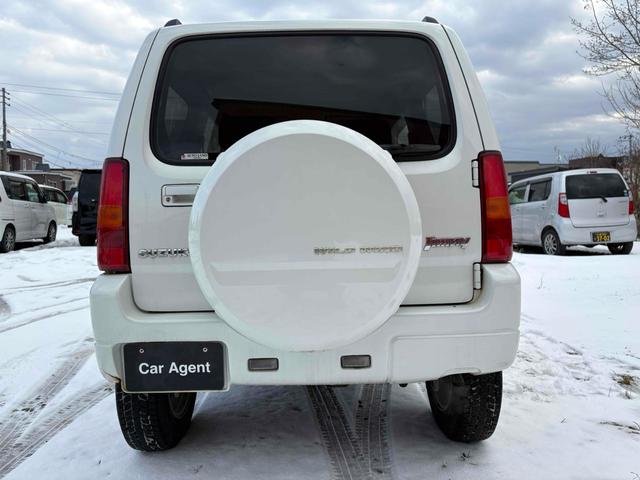 ジムニー ワイルドウインド 4WD フルセグTV ブルートゥース対応 キーレスエントリー 電動格納ミラー AT ABS ルーフレール アルミホイール 衝突安全ボディ エアコン パワーウィンドウ(16枚目)