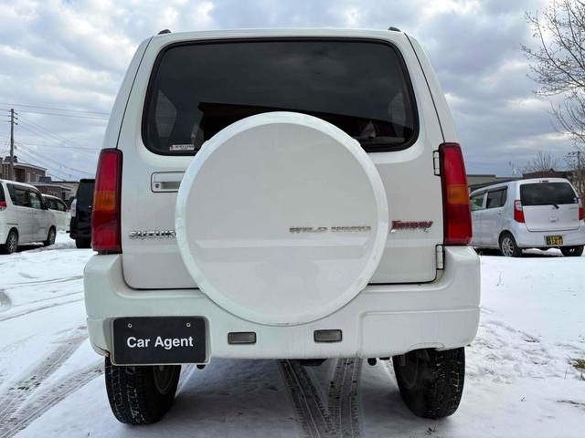 ジムニー ワイルドウインド 4WD フルセグTV ブルートゥース対応 キーレスエントリー 電動格納ミラー AT ABS ルーフレール アルミホイール 衝突安全ボディ エアコン パワーウィンドウ(17枚目)