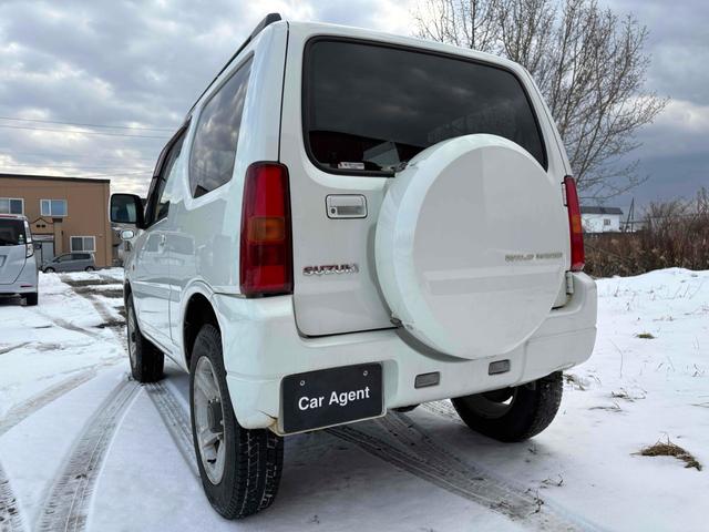 ジムニー ワイルドウインド 4WD フルセグTV ブルートゥース対応 キーレスエントリー 電動格納ミラー AT ABS ルーフレール アルミホイール 衝突安全ボディ エアコン パワーウィンドウ(19枚目)