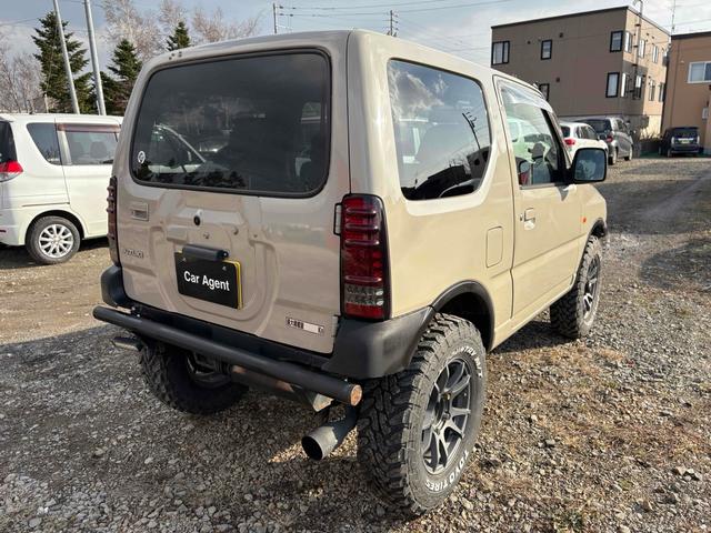 ジムニー ＦＩＳフリースタイルワールドカップリミテッド　全塗装済み　リフトアップ　４ＷＤ　ＥＴＣ　ＴＶ　キーレスエントリー　ＭＴ　ＡＢＳ　アルミホイール　衝突安全ボディ（12枚目）