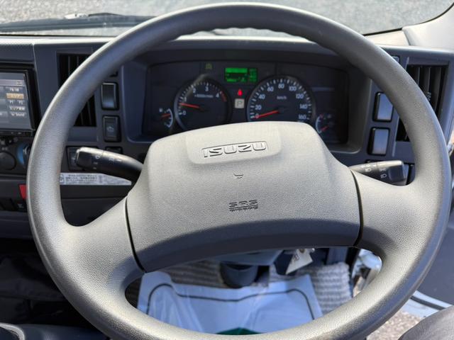 エルフトラック ◎3.5t ◎ワイド・ロング ◎4段ラジコンクレーン◎ハイジャッキアウトリガー ◎荷台内寸法 長さ430 幅208 高60cm ◎3方開アルミアオリ ◎リヤアウトリガー(手動)◎アルミブリッジ付(53枚目)