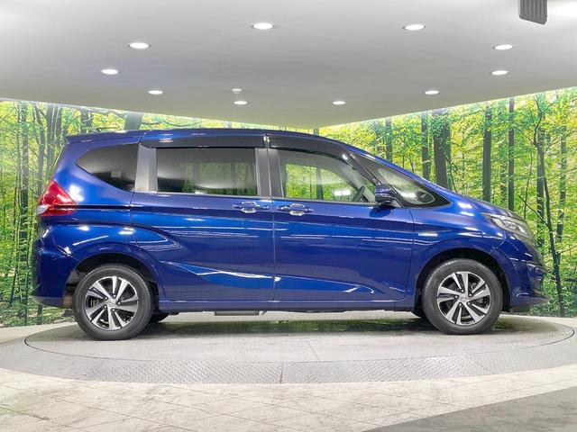 フリードハイブリッド ハイブリッド・Ｇホンダセンシング　純正９型ナビ　バックカメラ　両側電動ドア　シートヒーター　寒冷地仕様　ＬＥＤヘッド　ドラレコ　ＥＴＣ　レーダークルーズ　コーナーセンサー　純正１５ＡＷ　オートエアコン　ステアリングスイッチ　横滑り防止（58枚目）