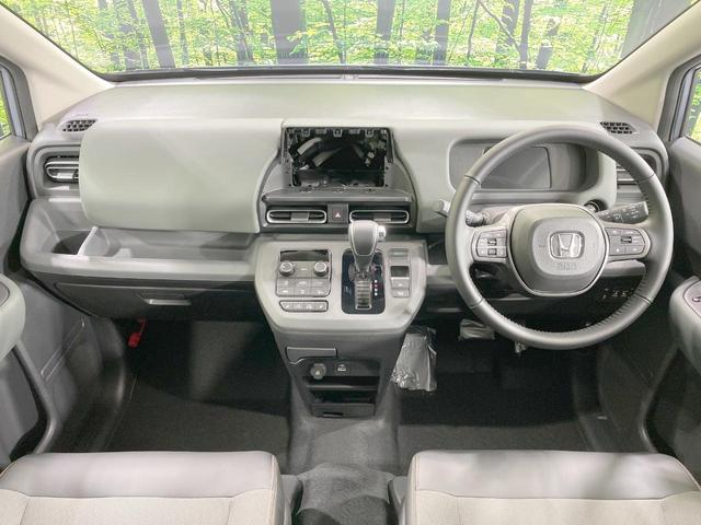 フリード e:HEVクロスター 登録済未使用車 両側電動ドア 衝突軽減 レーダークルーズ スマートキー LEDヘッド オートハイビーム クリアランスソナー オートライト オートエアコン 禁煙車 寒冷地仕様 純正15AW(2枚目)