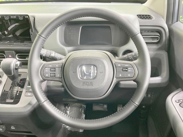 フリード e:HEVクロスター 登録済未使用車 両側電動ドア 衝突軽減 レーダークルーズ スマートキー LEDヘッド オートハイビーム クリアランスソナー オートライト オートエアコン 禁煙車 寒冷地仕様 純正15AW(13枚目)