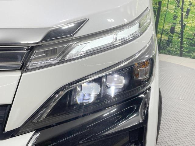ヴォクシー ＺＳ　煌ＩＩ　純正９型ナビ　バックカメラ　衝突軽減　両側電動ドア　７人乗り　寒冷地仕様　クルコン　ＬＥＤヘッド　純正１６ＡＷ　ステアリングスイッチ　デュアルエアコン　Ｂｌｕｅｔｏｏｔｈ再生　オートライト（53枚目）