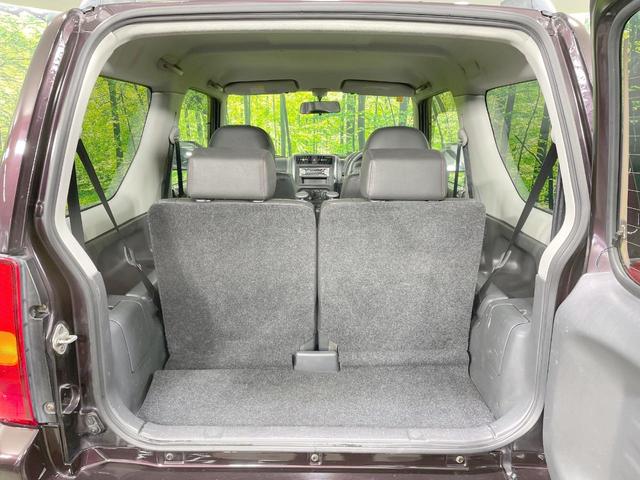 ジムニー ワイルドウインド　４ＷＤ　禁煙車　ターボ　シートヒーター　オーディオ　ルーフレール　純正１６ＡＷ　電動格納ミラー　ヘッドライトレベライザー　トラクションコントロール　衝突安全ボディ（11枚目）
