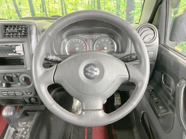 ジムニー ワイルドウインド　４ＷＤ　禁煙車　ターボ　シートヒーター　オーディオ　ルーフレール　純正１６ＡＷ　電動格納ミラー　ヘッドライトレベライザー　トラクションコントロール　衝突安全ボディ（12枚目）