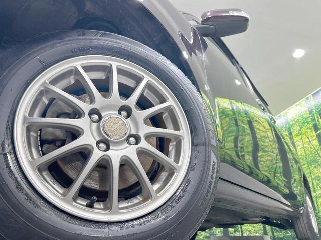 シエンタ ＤＩＣＥリミテッド　４ＷＤ　純正ナビ　バックカメラ　電動スライドドア　ＥＴＣ　７人乗り　ＨＩＤヘッドライト　１４インチＡＷ　電動格納ミラー　オートエアコン　トラクションコントロール　革巻きステアリング（15枚目）