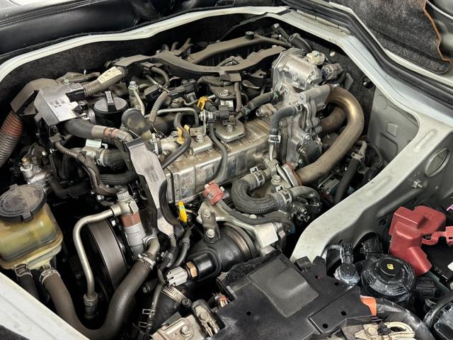 ハイエースバン スーパーＧＬ　ダークプライムＩＩ　トヨタセーフティセンス／ナイトロパワー１７インチ／新品ＴＯＹＯホワイトレター／ＬＥＤヘッドライト／オートハイビーム／レザー調シートカバー／コンビハンドル／純正メモリーナビＴＶ／Ｂカメラ／リアスポイラー（66枚目）