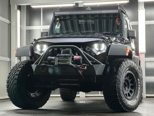 ジープ・ラングラーアンリミテッド スポーツ リフトアップ/マッドタイヤ/社外バンパー/社外グリル/社外ヘッドライト/サイドマーカー/サイドステップ/ルーフラック/テールガード/アルパインフローティングナビTV/バックカメラ/ETC車載器(13枚目)