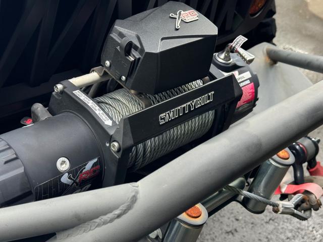 ジープ・ラングラーアンリミテッド スポーツ リフトアップ/マッドタイヤ/社外バンパー/社外グリル/社外ヘッドライト/サイドマーカー/サイドステップ/ルーフラック/テールガード/アルパインフローティングナビTV/バックカメラ/ETC車載器(16枚目)