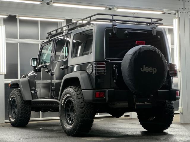 ジープ・ラングラーアンリミテッド スポーツ リフトアップ/マッドタイヤ/社外バンパー/社外グリル/社外ヘッドライト/サイドマーカー/サイドステップ/ルーフラック/テールガード/アルパインフローティングナビTV/バックカメラ/ETC車載器(25枚目)