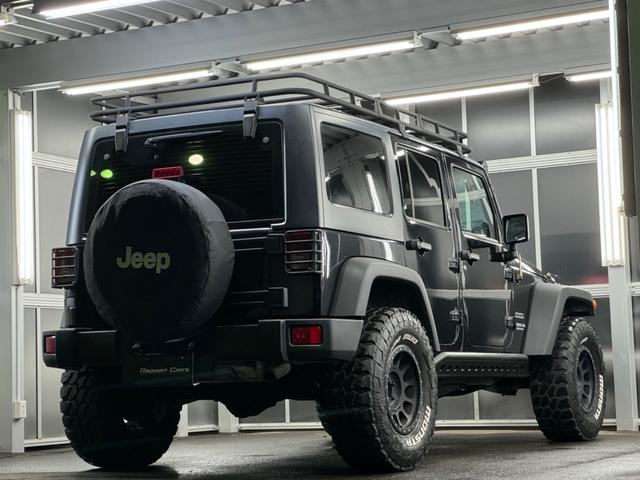 ジープ・ラングラーアンリミテッド スポーツ リフトアップ/マッドタイヤ/社外バンパー/社外グリル/社外ヘッドライト/サイドマーカー/サイドステップ/ルーフラック/テールガード/アルパインフローティングナビTV/バックカメラ/ETC車載器(26枚目)