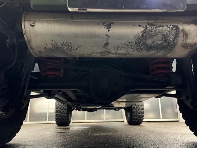 ジープ・ラングラーアンリミテッド スポーツ リフトアップ/マッドタイヤ/社外バンパー/社外グリル/社外ヘッドライト/サイドマーカー/サイドステップ/ルーフラック/テールガード/アルパインフローティングナビTV/バックカメラ/ETC車載器(29枚目)