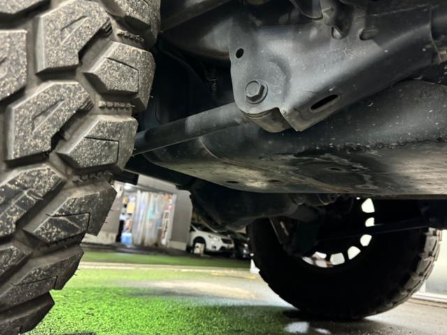 ジープ・ラングラーアンリミテッド スポーツ リフトアップ/マッドタイヤ/社外バンパー/社外グリル/社外ヘッドライト/サイドマーカー/サイドステップ/ルーフラック/テールガード/アルパインフローティングナビTV/バックカメラ/ETC車載器(32枚目)