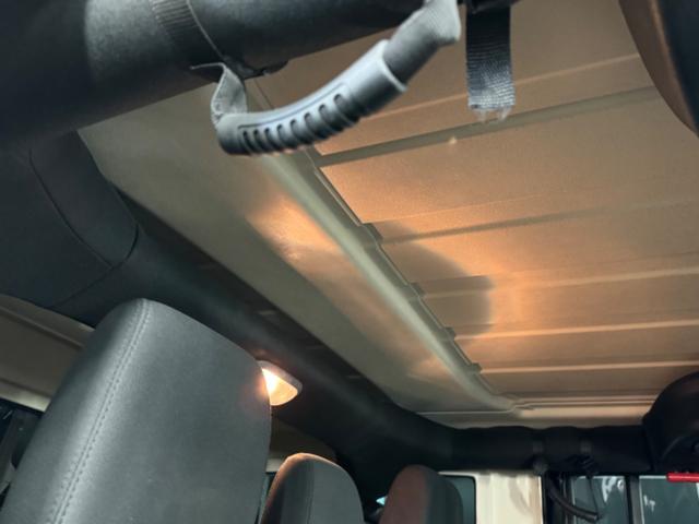 ジープ・ラングラーアンリミテッド スポーツ リフトアップ/マッドタイヤ/社外バンパー/社外グリル/社外ヘッドライト/サイドマーカー/サイドステップ/ルーフラック/テールガード/アルパインフローティングナビTV/バックカメラ/ETC車載器(44枚目)