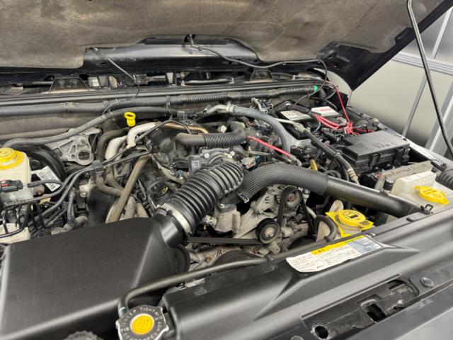 ジープ・ラングラーアンリミテッド スポーツ リフトアップ/マッドタイヤ/社外バンパー/社外グリル/社外ヘッドライト/サイドマーカー/サイドステップ/ルーフラック/テールガード/アルパインフローティングナビTV/バックカメラ/ETC車載器(65枚目)