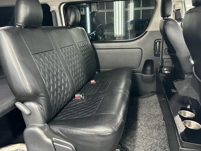 ハイエースバン ロングワイドスーパーＧＬ　本州仕入れ／ナイトロパワー１７インチ／新品タイヤ／ローダウン／ベッドキット／両側パワースライド／ＬＥＤヘッドライト／社外ＳＤナビＴＶ／追加スピーカー／バックカメラ／ＥＴＣ車載器／ドラレコ／シートカバー（39枚目）