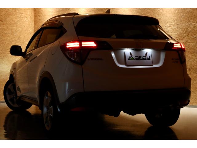 ヴェゼル ハイブリッドＸ・Ｌパッケージ　８型ＳＤナビ　黒半革　衝突軽減ブレーキ　バックカメラ　ＥＴＣ　シートヒーター　クルーズコントロール　パドルシフト　ＬＥＤヘッドライト／ＬＥＤフォグ／ＬＥＤテール　ＬＥＤルームランプ　純正１７インチＡＷ（68枚目）