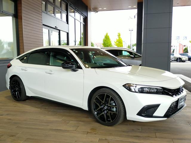 シビック e:HEV Bluetooth対応ホンダコネクトナビ/3モードバックカメラ/BOSEサウンドシステム/LEDヘッドライト/ETC2.0/ブラインドスポットインフォ/前後ドライブレコーダー/夏冬タイヤセット(3枚目)