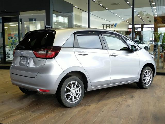 フィット ｅ：ＨＥＶホーム　Ｂｌｕｅｔｏｏｔｈ対応ワンセグナビ／３モードバックカメラ／ＥＴＣ／ホンダセンシング／ＬＥＤヘッドライト／ステアリングリモコン／フロントドライブレコーダー／リモコンエンジンスターター／夏冬タイヤセット（18枚目）