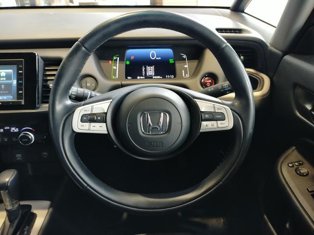 フィット ｅ：ＨＥＶホーム　Ｂｌｕｅｔｏｏｔｈ対応ワンセグナビ／３モードバックカメラ／ＥＴＣ／ホンダセンシング／ＬＥＤヘッドライト／ステアリングリモコン／フロントドライブレコーダー／リモコンエンジンスターター／夏冬タイヤセット（35枚目）
