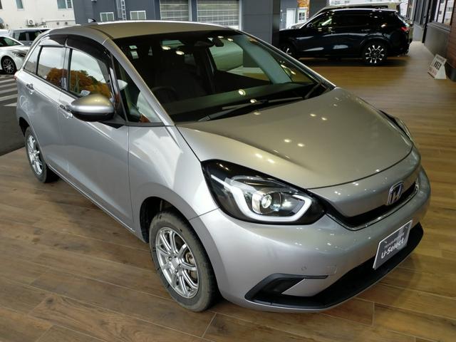 フィット ｅ：ＨＥＶホーム　Ｂｌｕｅｔｏｏｔｈ対応ワンセグナビ／３モードバックカメラ／ＥＴＣ／ホンダセンシング／ＬＥＤヘッドライト／ステアリングリモコン／フロントドライブレコーダー／リモコンエンジンスターター／夏冬タイヤセット（65枚目）