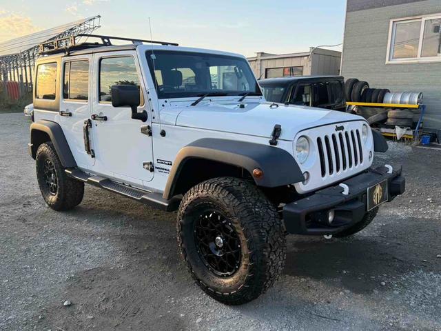 ジープ・ラングラーアンリミテッド スポーツ　４ＷＤ　オートクルーズコントロール　ＡＴ　盗難防止システム　Ｂｌｕｅｔｏｏｔｈ　ＡＢＳ　エアコン　パワーウィンドウ（13枚目）