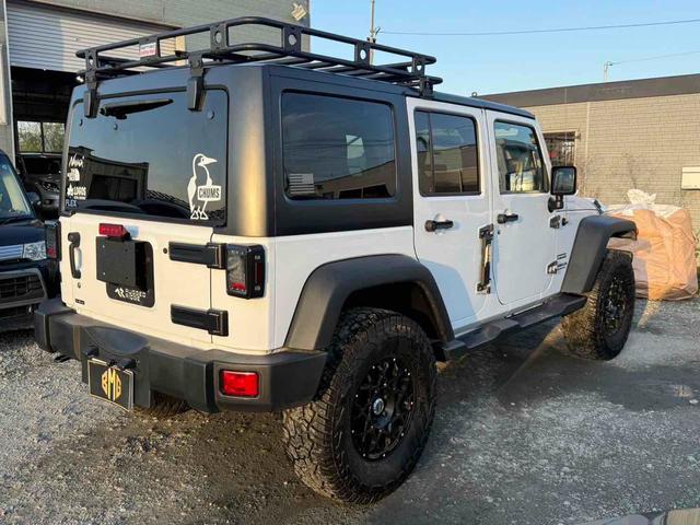 ジープ・ラングラーアンリミテッド スポーツ　４ＷＤ　オートクルーズコントロール　ＡＴ　盗難防止システム　Ｂｌｕｅｔｏｏｔｈ　ＡＢＳ　エアコン　パワーウィンドウ（15枚目）