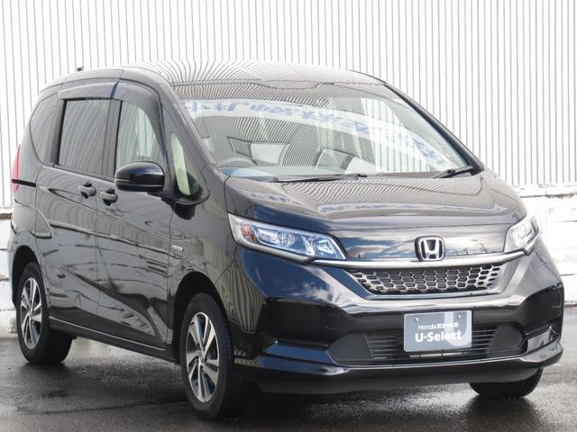 フリードハイブリッド ハイブリッド・Gホンダセンシング i-サイドエアバッグ+サイドカーテンエアバッグ/リア両側パワースライドドア/LEDヘッドライト+アクティブコーナリングライト/センターテーブルオートリトラミラー/Cパッケージ/Sパッケージ(3枚目)