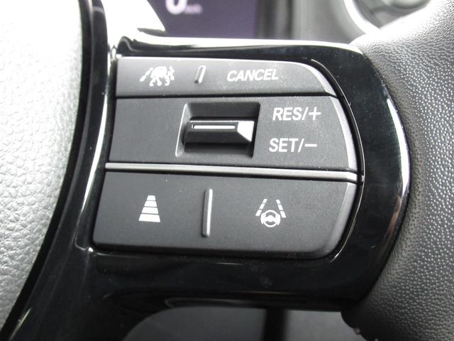 Ｎ－ＢＯＸカスタム コーディネートスタイル　試乗車ＵＰ／運転席＆助手席シートヒーター／コンビニフック付シートバックテーブル（運転席＆助手席）／オートリトラミラー／左右独立式リアセンターアームレスト／グレーステッチ本革巻ステアリングホイール（65枚目）