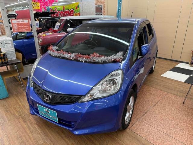フィット Ｌ　４ＷＤ　ＥＴＣ　アルミホイール　ＨＩＤ　スマートキー　電動格納ミラー　ＡＴ　盗難防止システム　衝突安全ボディ　ＡＢＳ　ＣＤ　ミュージックプレイヤー接続可　エアコン　パワーステアリング　パワーウィンドウ（12枚目）