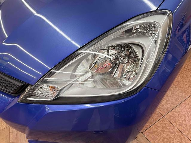 フィット Ｌ　４ＷＤ　ＥＴＣ　アルミホイール　ＨＩＤ　スマートキー　電動格納ミラー　ＡＴ　盗難防止システム　衝突安全ボディ　ＡＢＳ　ＣＤ　ミュージックプレイヤー接続可　エアコン　パワーステアリング　パワーウィンドウ（24枚目）