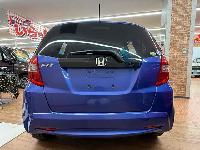 フィット Ｌ　４ＷＤ　ＥＴＣ　アルミホイール　ＨＩＤ　スマートキー　電動格納ミラー　ＡＴ　盗難防止システム　衝突安全ボディ　ＡＢＳ　ＣＤ　ミュージックプレイヤー接続可　エアコン　パワーステアリング　パワーウィンドウ（27枚目）