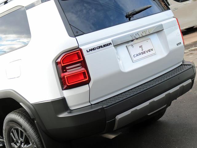 ランドクルーザー250 VX JBLサウンド 丸目1眼LED 12.3インチナビTV 全周囲カメラ サンフール 黒革シート トヨタチームメイト シートエアコン デジタルインナーミラー ブラインドスポットモニター パワーバックドア(38枚目)