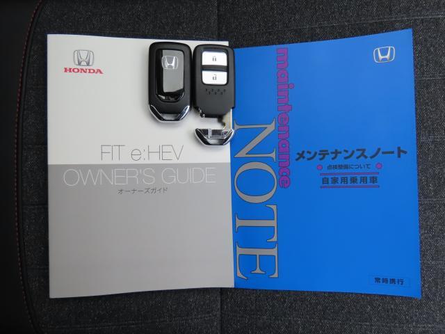 フィット e:HEVホーム20周年特別仕様車カーサ ホンダセンシング 4WD バックカメラ アルミホイール シートヒーター オートクルーズコントロール アイドリングストップ 衝突防止システム LEDヘッドランプ スマートキー 横滑り防止装置 エアバッグ(21枚目)