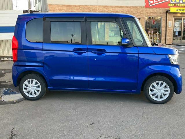 Ｎ－ＢＯＸ Ｇ・Ｌホンダセンシング　４ＷＤ　社外ワンセグナビ　バックカメラ　ＥＴＣ　左側パワースライドドア　プッシュスタート　ＨＤＭＩ　ＵＳＢ　横滑り防止装置　冬タイヤ　衝突軽減ブレーキ　バニティミラー（5枚目）