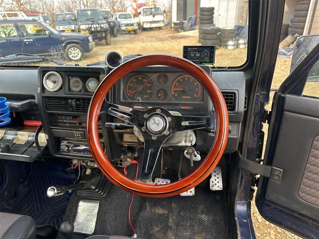 ジムニー ランドベンチャー　５型　最終ＭＴ　リフトアップ　エアコン　パワステ　ドライブレコーダー　ＥＴＣ　ＭＴタイヤ　ＣＤ　ミュージックプレイヤー接続可　アルミホイール　前後社外バンパー（14枚目）