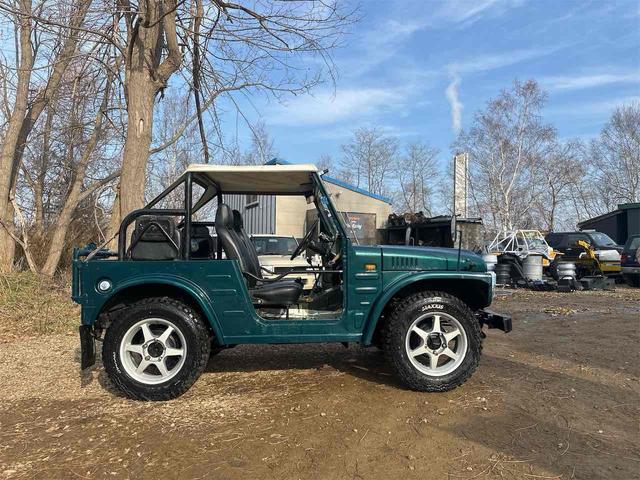 ジムニー 　ＳＪ１０幌　エンジン載せ替え　腰上オーバーホール済　ＳＪ３０ヘッド取付　点火強化　４ＷＤ　スズキスポーツアルミホイール　４速ＭＴ　ドア張替え　全塗装歴有（8枚目）