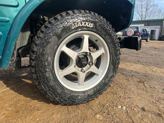 ジムニー 　ＳＪ１０幌　エンジン載せ替え　腰上オーバーホール済　ＳＪ３０ヘッド取付　点火強化　４ＷＤ　スズキスポーツアルミホイール　４速ＭＴ　ドア張替え　全塗装歴有（14枚目）